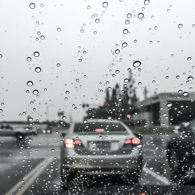 Beads of Water Shown on Windshield Treated with Rain Repellent Coating